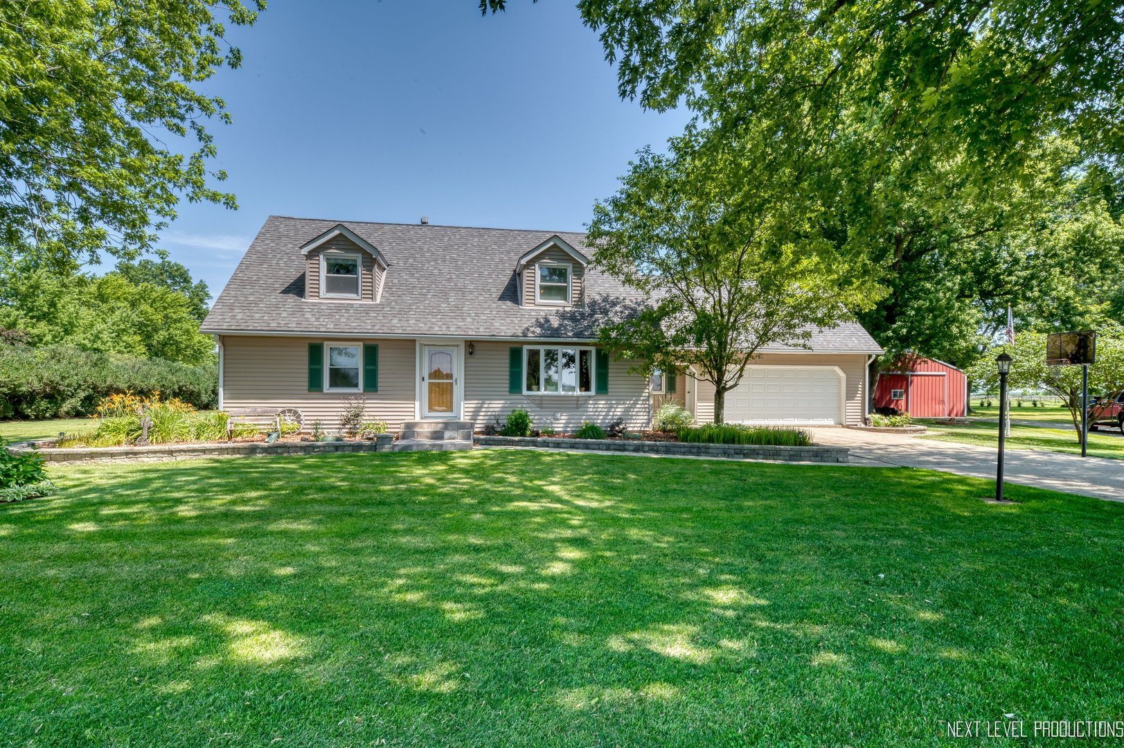 14815 Sears Road Plano, IL 60545 - Photo 2 of 30 a front view of a house with a yard