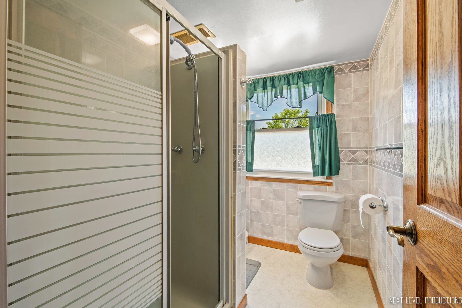 14815 Sears Road Plano, IL 60545 - Photo 30 of 30 a bathroom with a toilet and a shower