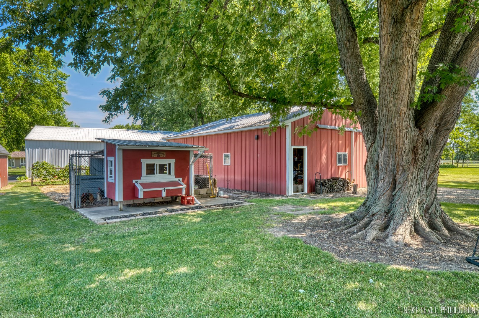 14815 Sears Road Plano, IL 60545 - Photo 4 of 30 a front view of a house with garden