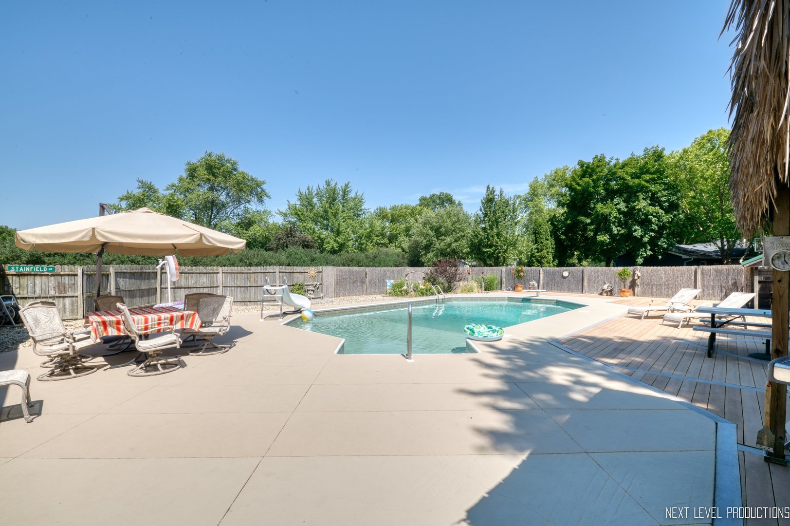 14815 Sears Road Plano, IL 60545 - Photo 5 of 30 a view of swimming pool and lounge chairs