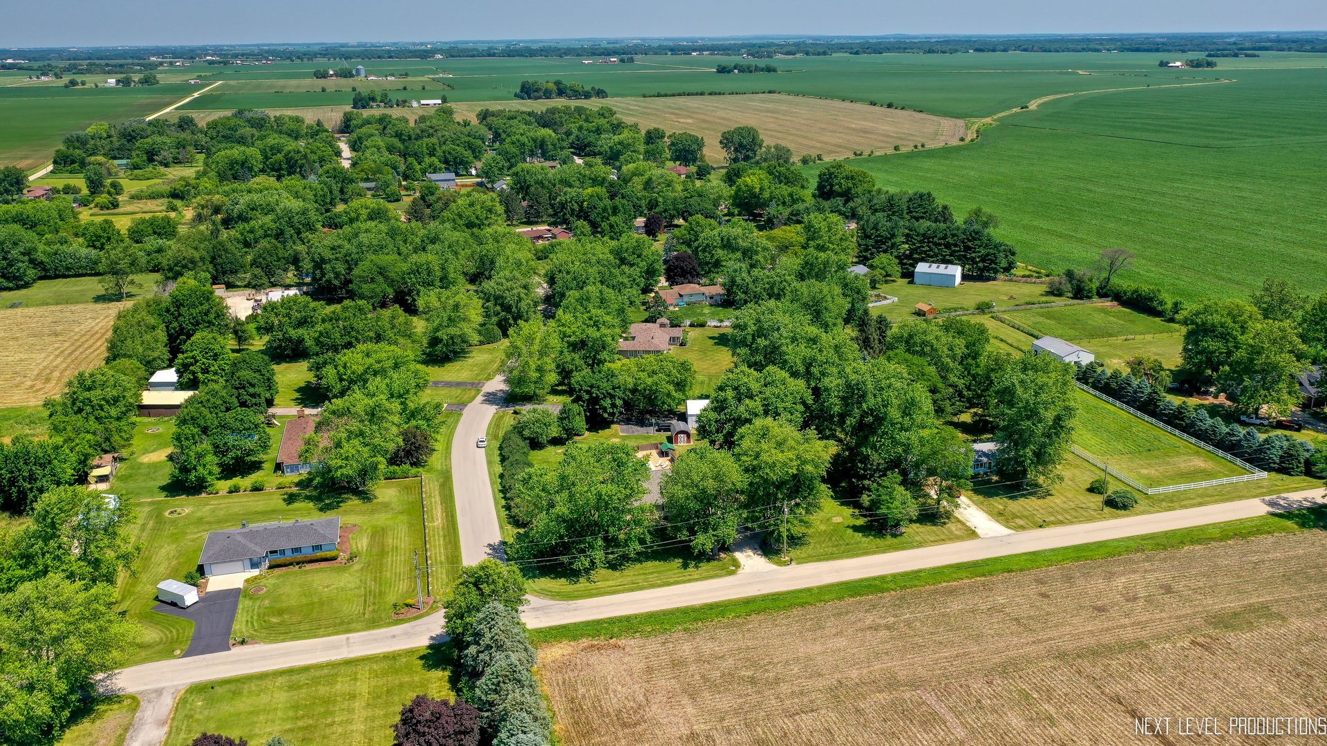 14815 Sears Road Plano, IL 60545 - Photo 10 of 30 an aerial view of a houses with a yard