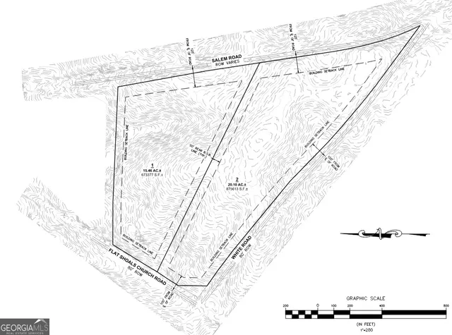 a view of a backyard of the house