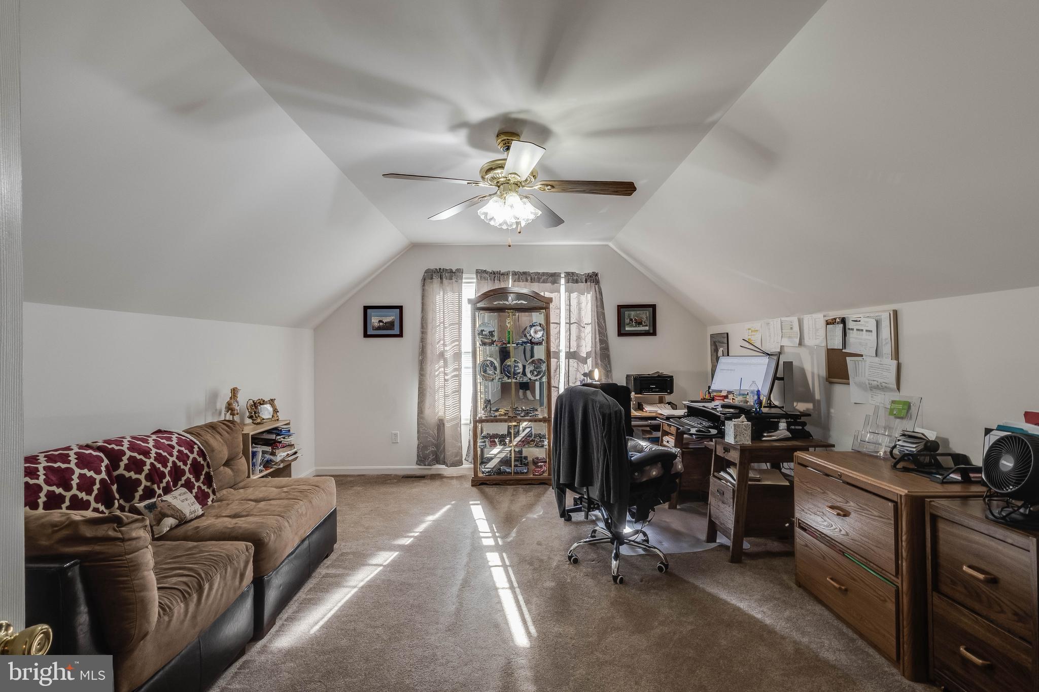 4757 Long Swamp Road Federalsburg, MD 21632 - Photo 21 of 47 a view of a livingroom with workspace and a window