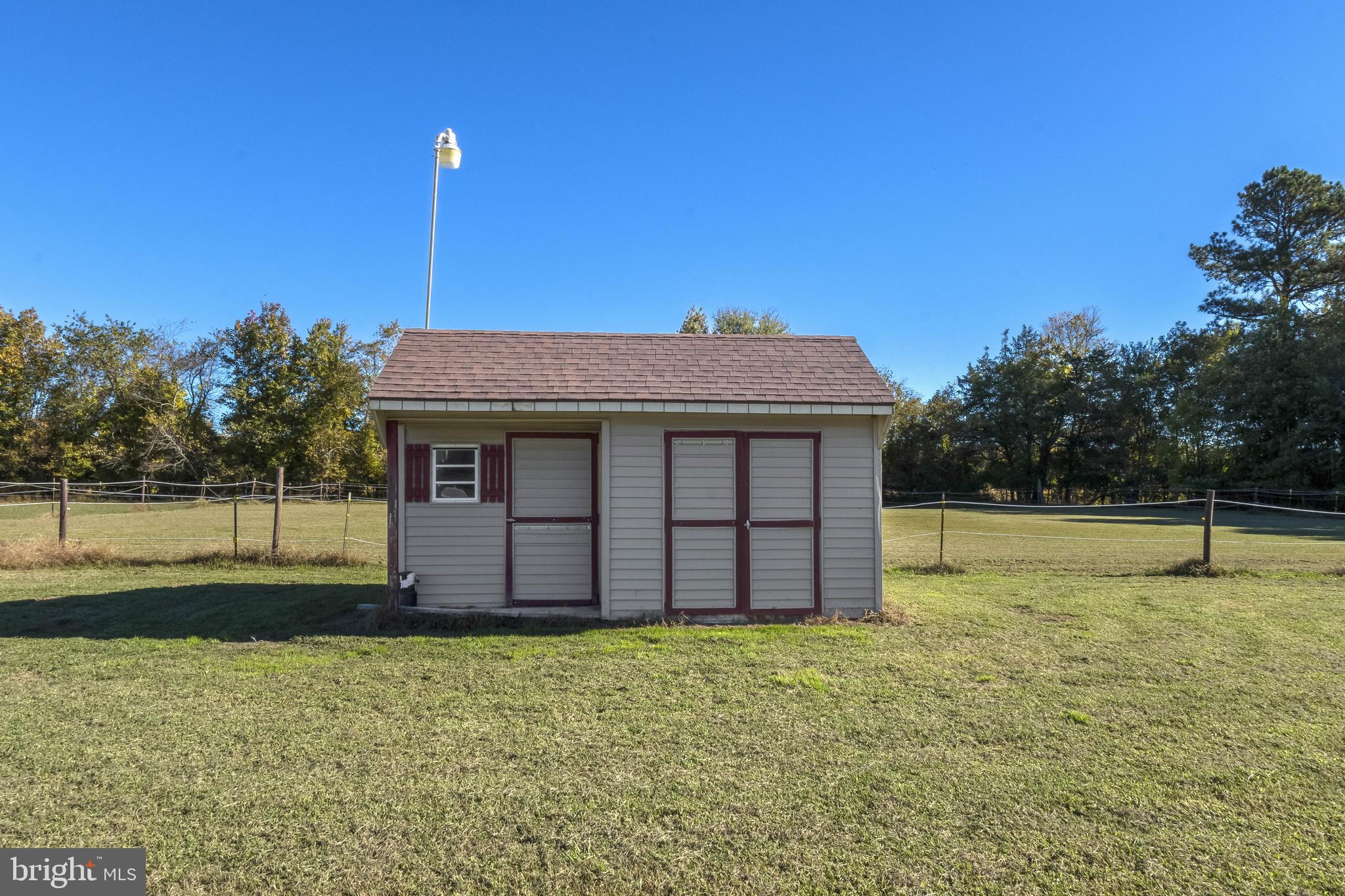 4757 Long Swamp Road Federalsburg, MD 21632 - Photo 35 of 47 a view of a house with a backyard