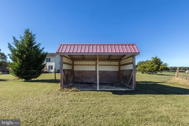 a view of a two chairs in a patio