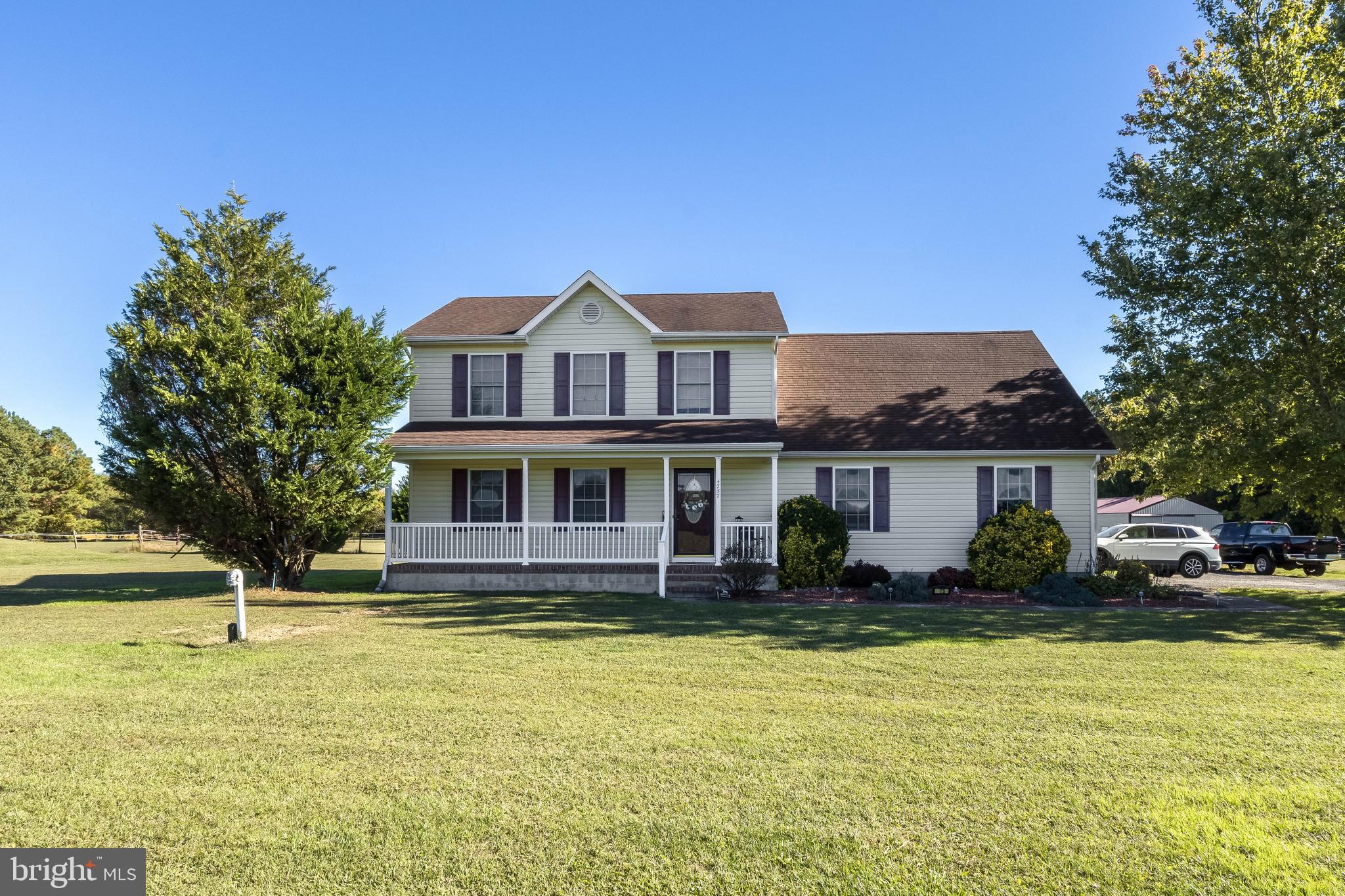 4757 Long Swamp Road Federalsburg, MD 21632 - Photo 45 of 47 a front view of a house with a yard