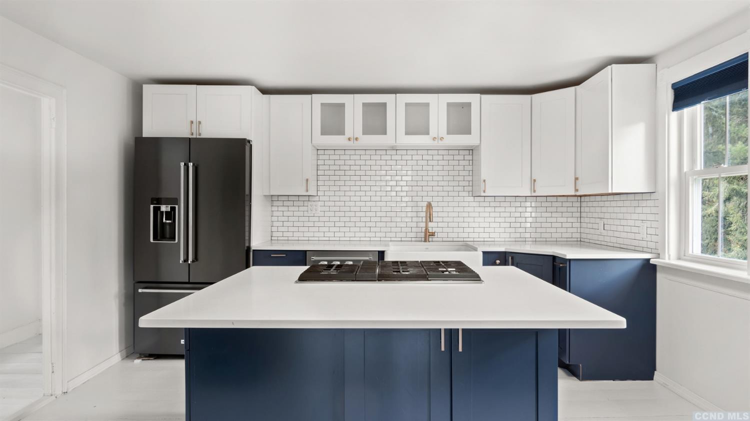18 Old Queechy Road Canaan, NY 12029 - Photo 11 of 52 a kitchen with stainless steel appliances a sink a table and chairs