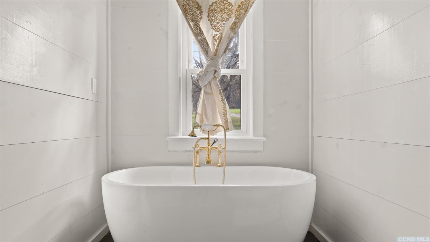 18 Old Queechy Road Canaan, NY 12029 - Photo 17 of 52 a white bath tub sitting in a bathroom