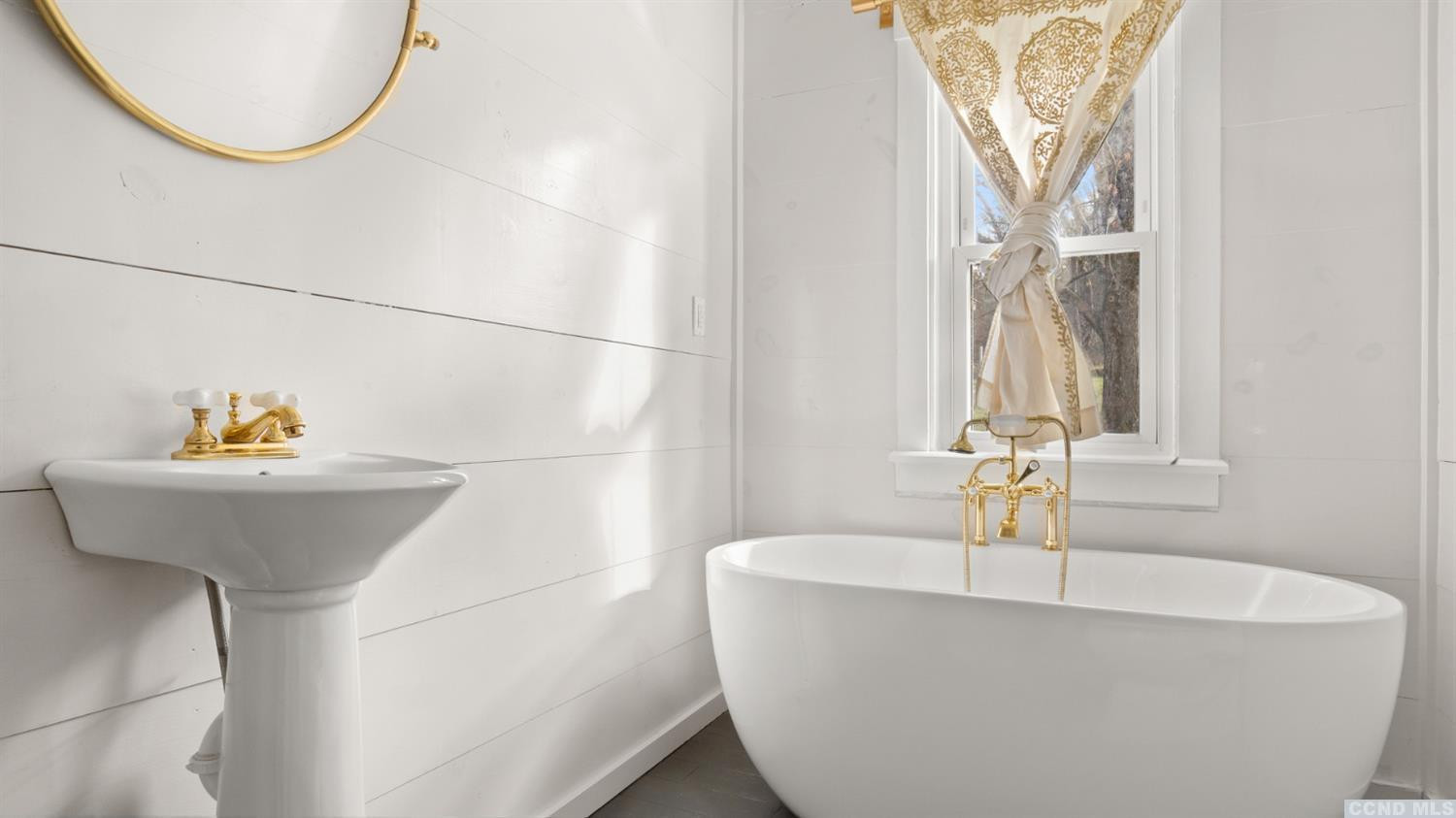 18 Old Queechy Road Canaan, NY 12029 - Photo 18 of 52 a bathroom with a sink and a window