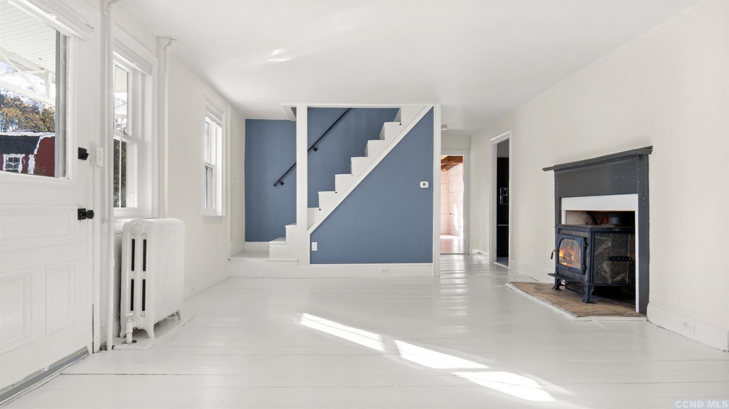 18 Old Queechy Road Canaan, NY 12029 - Photo 23 of 52 a view of a hallway with wooden floor and staircase