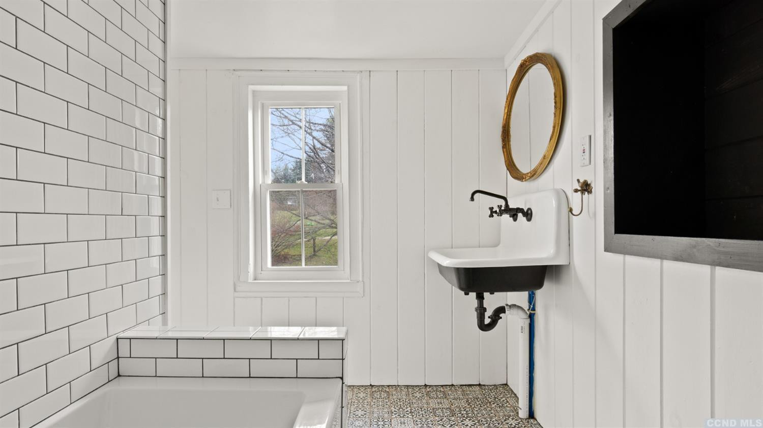 18 Old Queechy Road Canaan, NY 12029 - Photo 34 of 52 a bathroom with a sink a mirror and a window