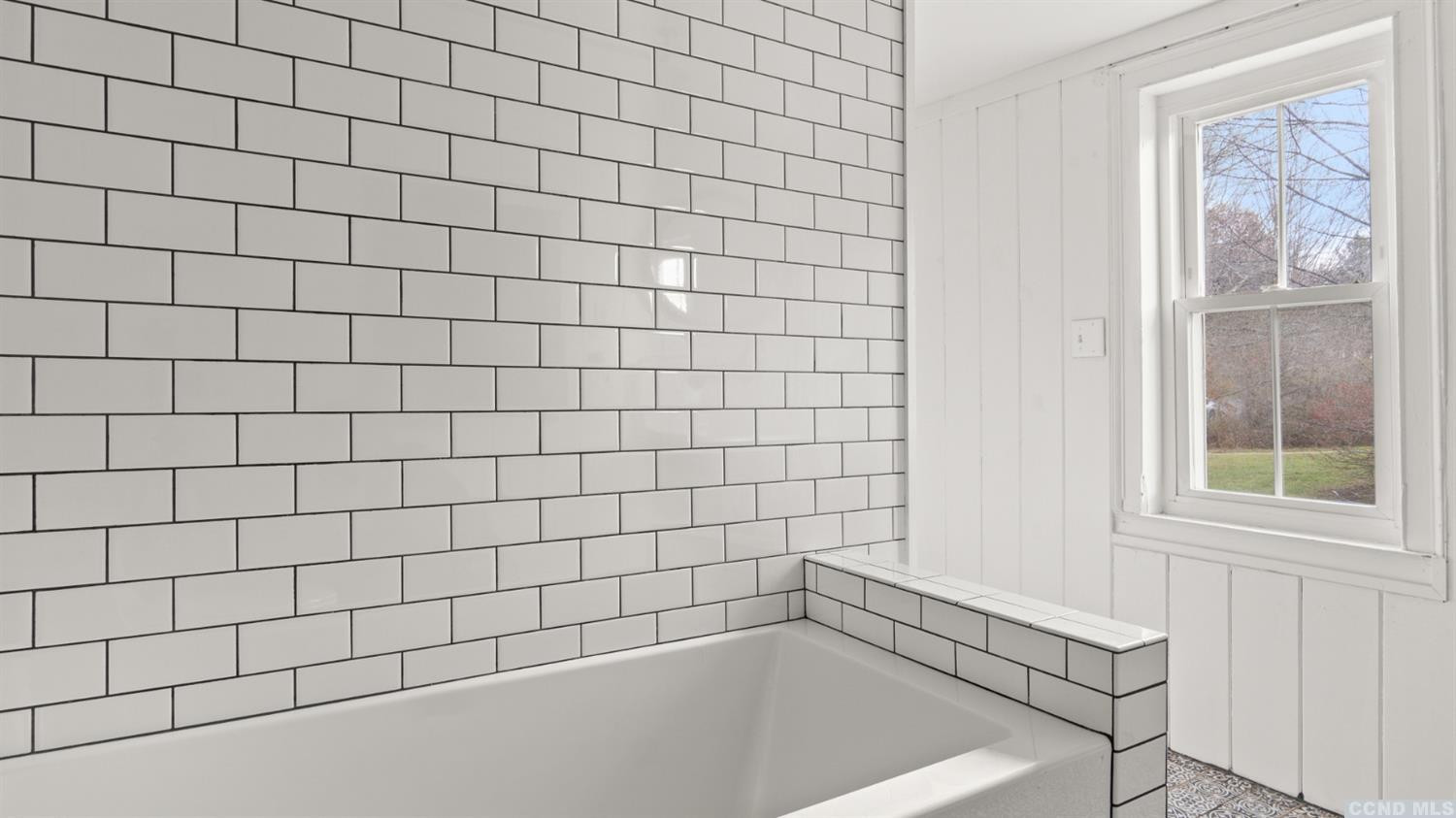 18 Old Queechy Road Canaan, NY 12029 - Photo 35 of 52 a bathroom with a bathtub and window