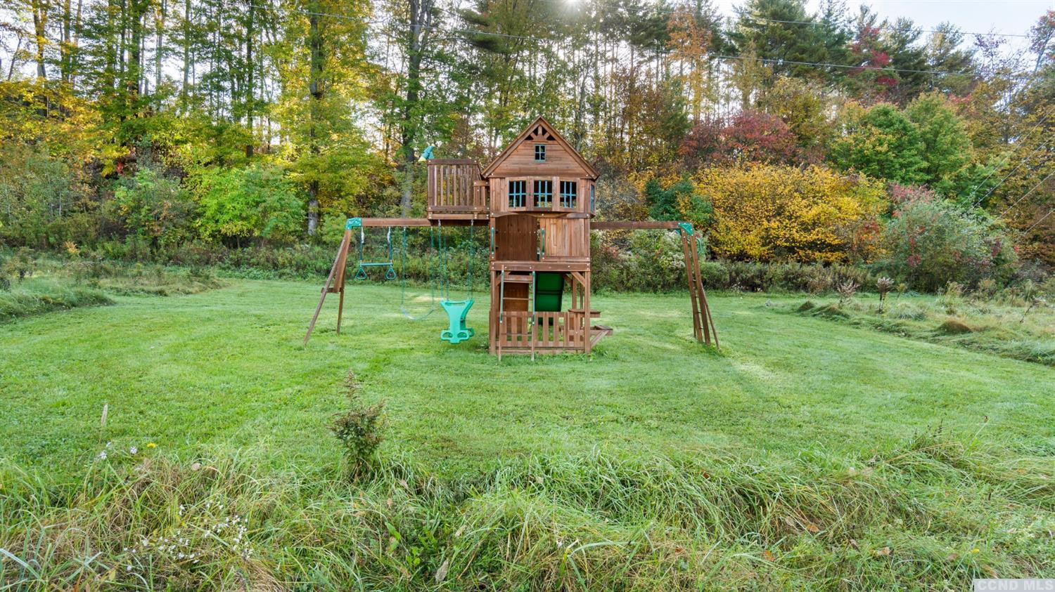 18 Old Queechy Road Canaan, NY 12029 - Photo 43 of 52 a sign board with tall trees