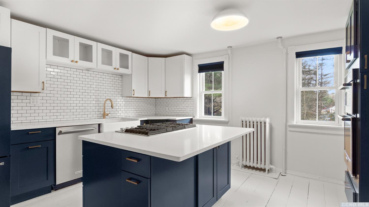 18 Old Queechy Road Canaan, NY 12029 - Photo 9 of 52 a kitchen that has a sink and a stove in it