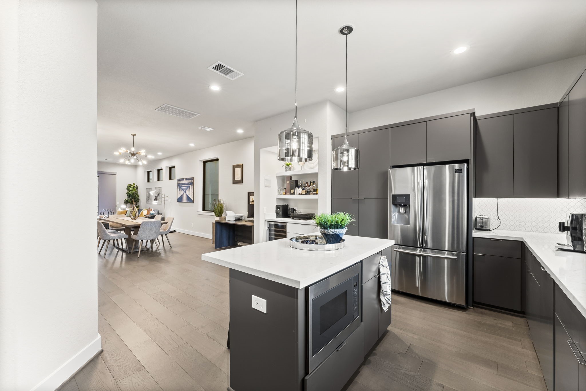 4227 Allen Street Houston, TX 77007 - Photo 11 of 30 a kitchen with a refrigerator a oven and a sink