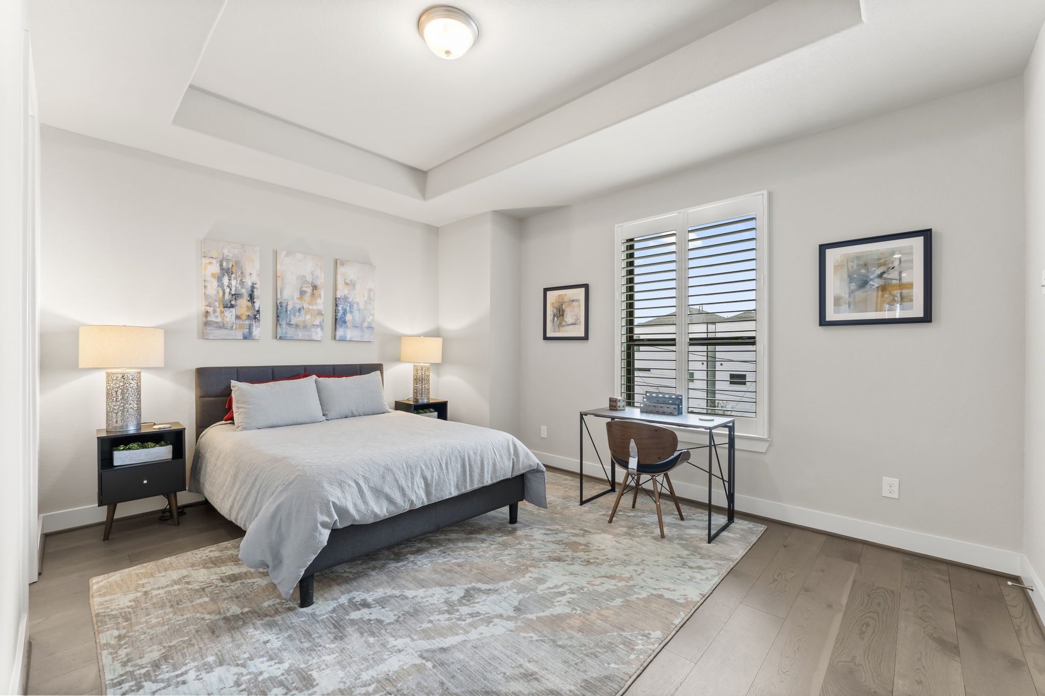 4227 Allen Street Houston, TX 77007 - Photo 18 of 30 a bedroom with a bed chair and a window