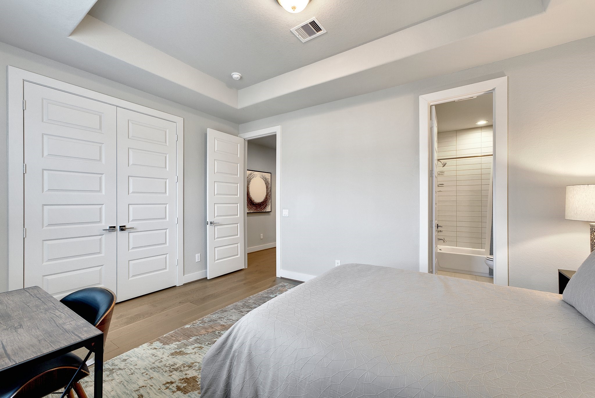 4227 Allen Street Houston, TX 77007 - Photo 19 of 30 a bedroom with a bed and cabinets