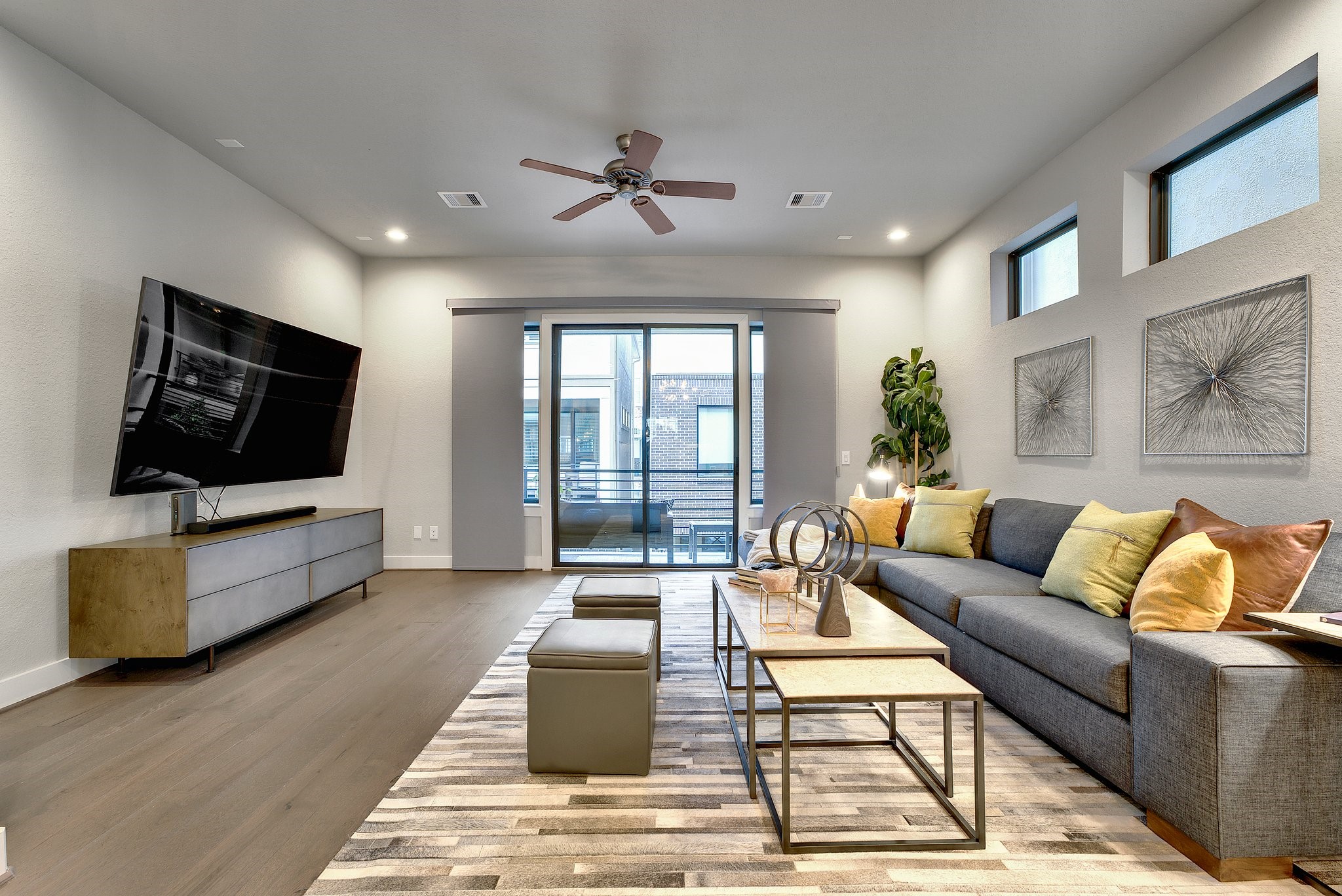 4227 Allen Street Houston, TX 77007 - Photo 7 of 30 a living room with furniture and a flat screen tv