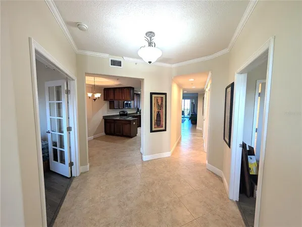a view of a big room with closet and a living room