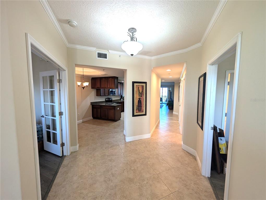 7070 Key Haven Road, Unit 602 Seminole, FL 33777 - Photo 16 of 48 a view of a big room with closet and a living room