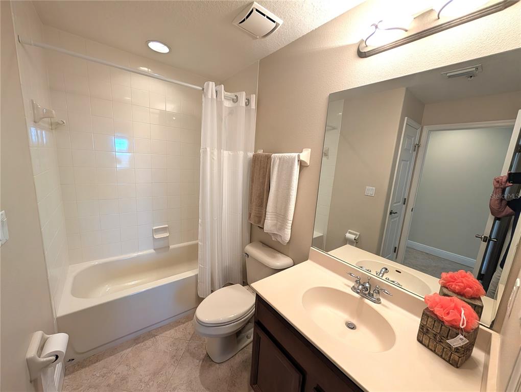 7070 Key Haven Road, Unit 602 Seminole, FL 33777 - Photo 29 of 48 a bathroom with a sink toilet tub and shower