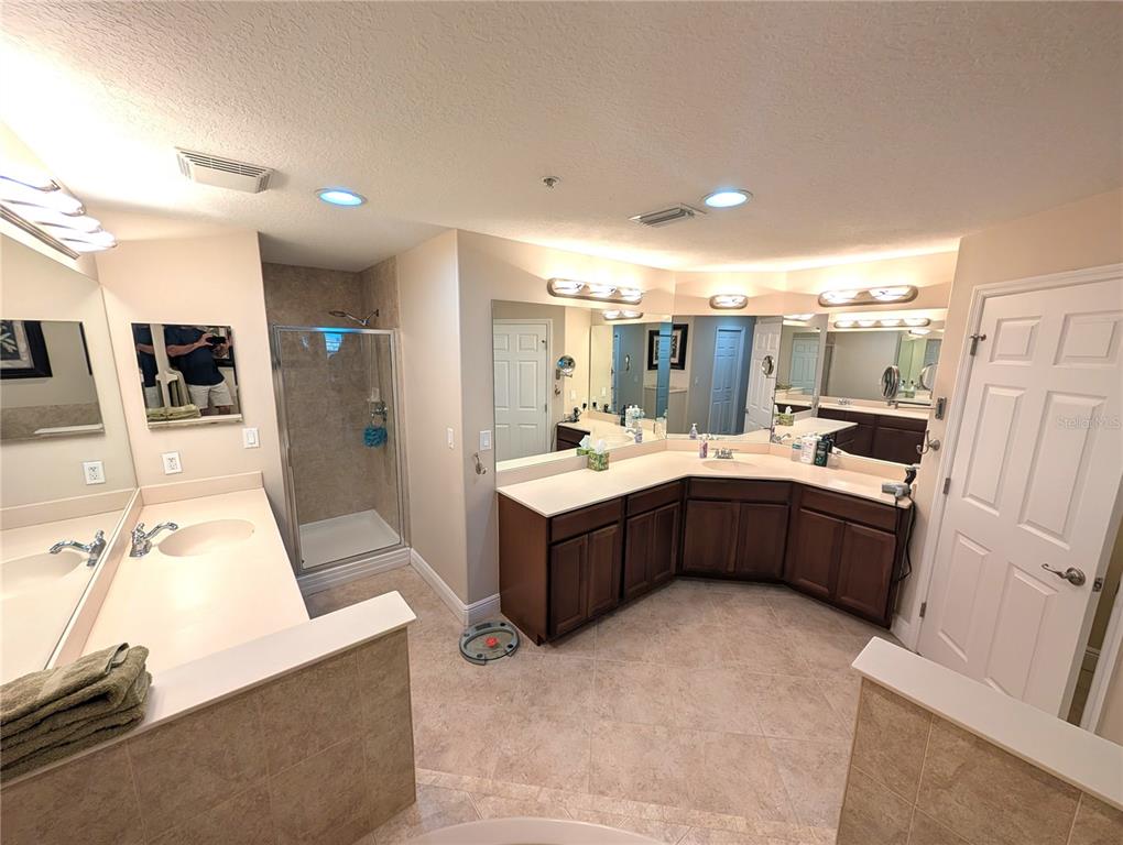 7070 Key Haven Road, Unit 602 Seminole, FL 33777 - Photo 34 of 48 a kitchen with a sink counter top space and stainless steel appliances