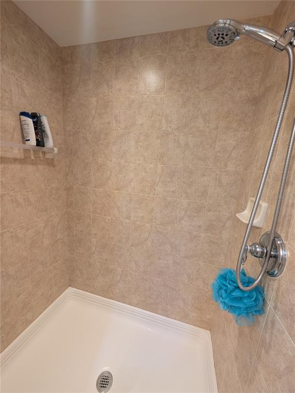 7070 Key Haven Road, Unit 602 Seminole, FL 33777 - Photo 38 of 48 a bathroom with a shower