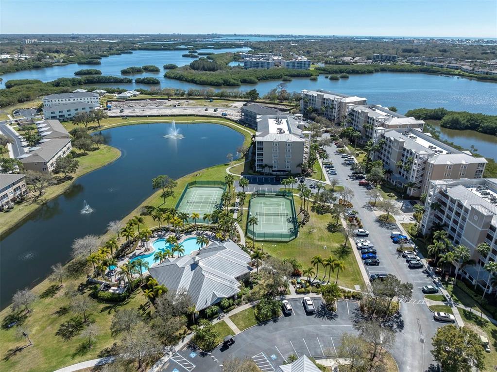 7070 Key Haven Road, Unit 602 Seminole, FL 33777 - Photo 39 of 48 an aerial view of a house with a lake view