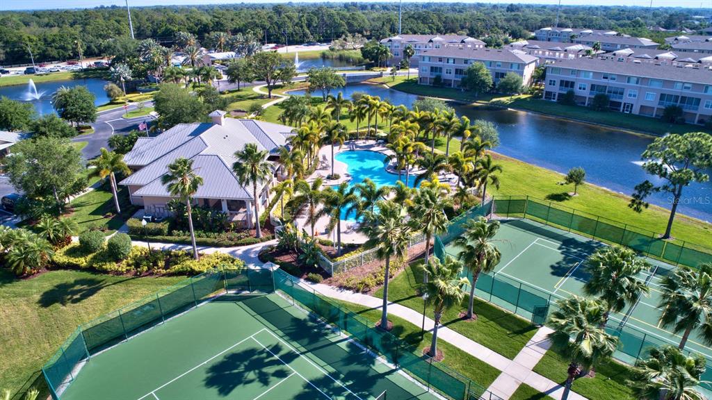 7070 Key Haven Road, Unit 602 Seminole, FL 33777 - Photo 5 of 48 an aerial view of residential houses with outdoor space