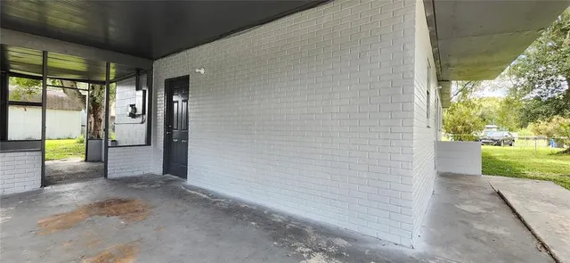 a view of a porch with backyard