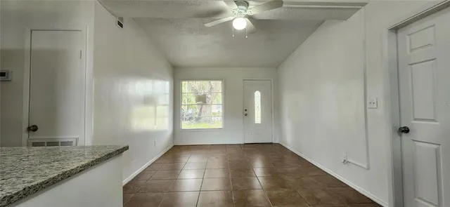 a view of an empty room and window