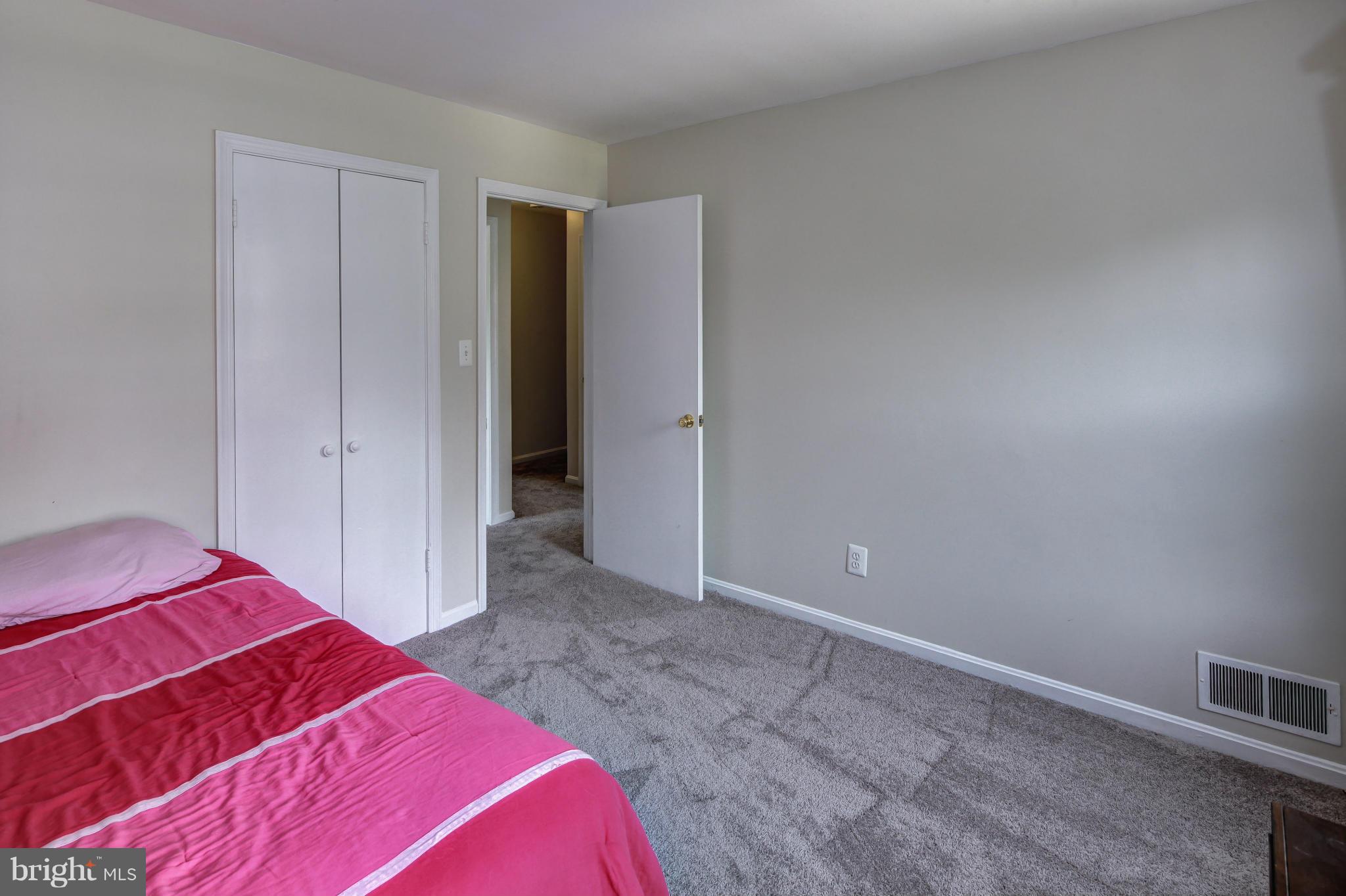 1530 Arbor View Road Silver Spring, MD 20902 - Photo 19 of 30 a bedroom with a bed and a closet