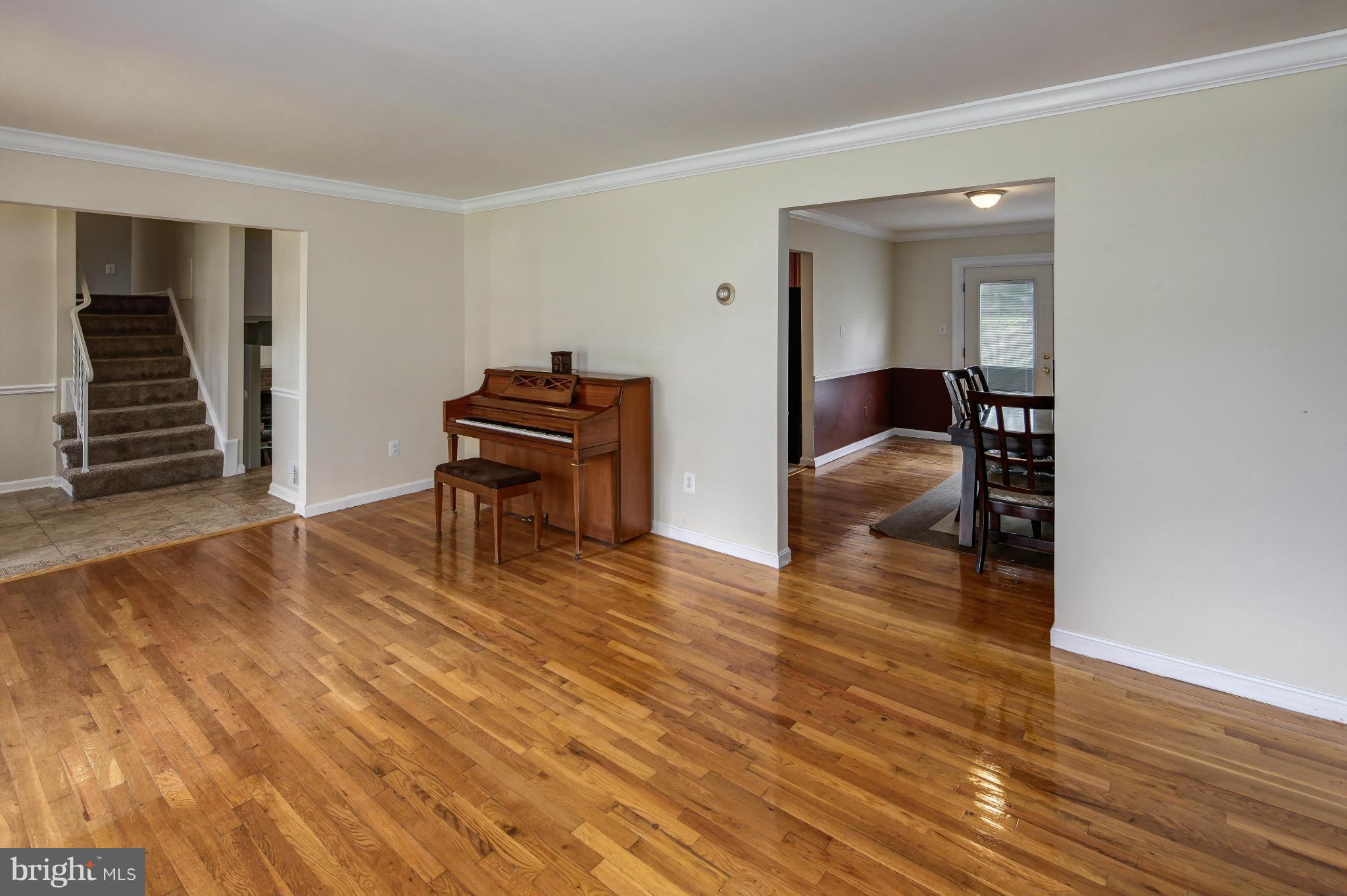 1530 Arbor View Road Silver Spring, MD 20902 - Photo 4 of 30 a bedroom with wooden floor and furniture