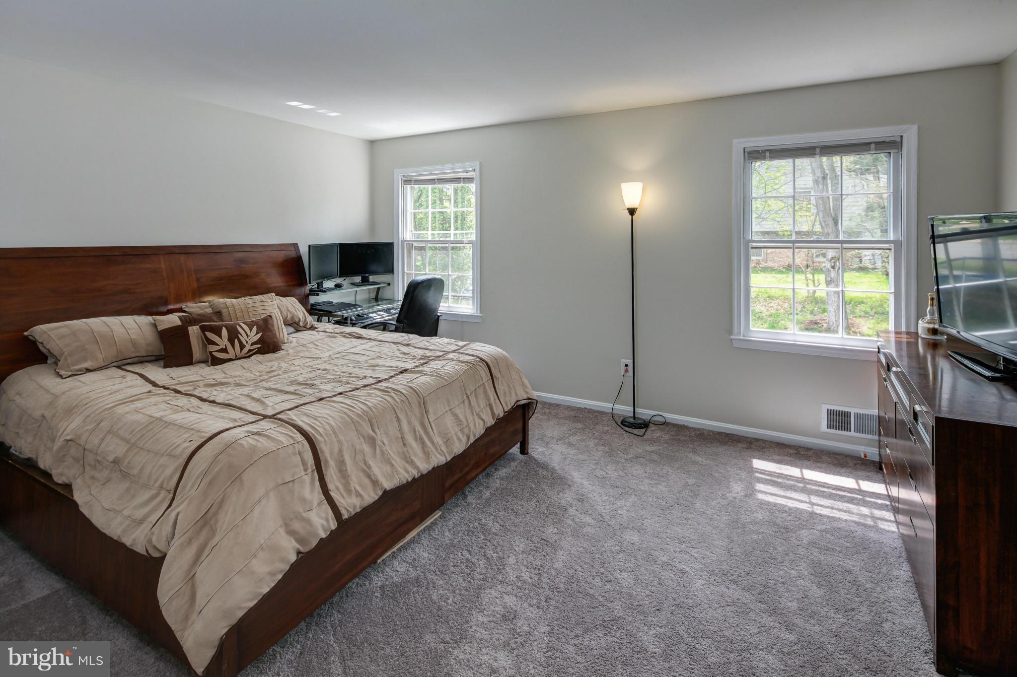1530 Arbor View Road Silver Spring, MD 20902 - Photo 10 of 30 a bedroom with a bed and a window