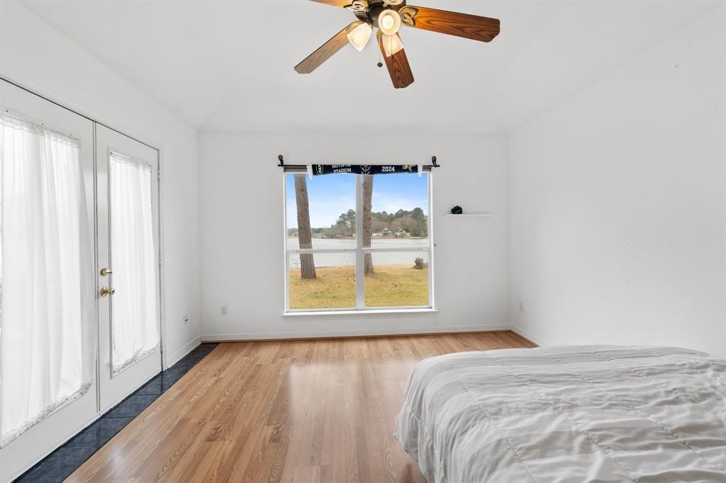 467 Pinnacle Trinity, TX 75862 - Photo 14 of 40 a bedroom with a bed and a window