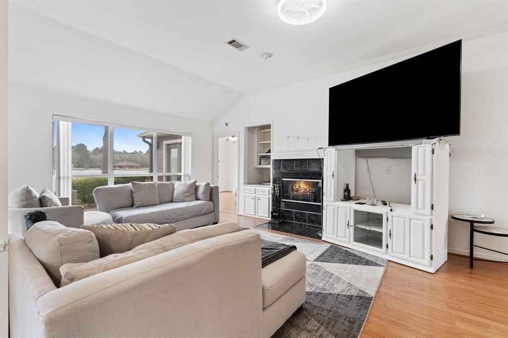 467 Pinnacle Trinity, TX 75862 - Photo 24 of 40 a living room with furniture and a flat screen tv