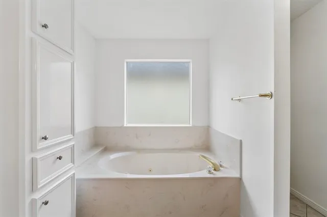 a bathroom with a bathtub
