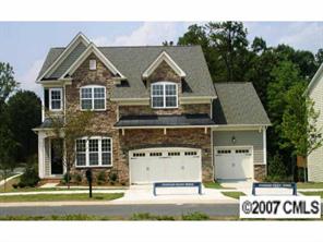 507 Quicksilver Trail, Unit 35 Fort Mill, SC 29708 - Photo 1 of 7 a front view of a house with a yard