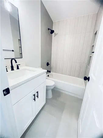 an empty room with a bench