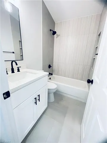 an empty room with a bench