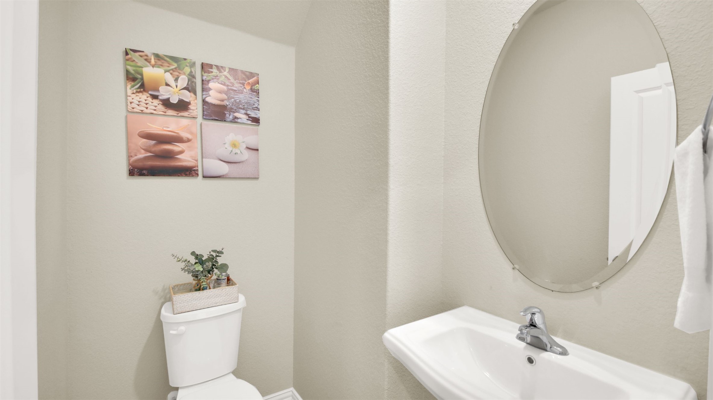 13716 Sugar Bush Path Manor, TX 78653 - Photo 12 of 37 Half bath with toilet and a sink