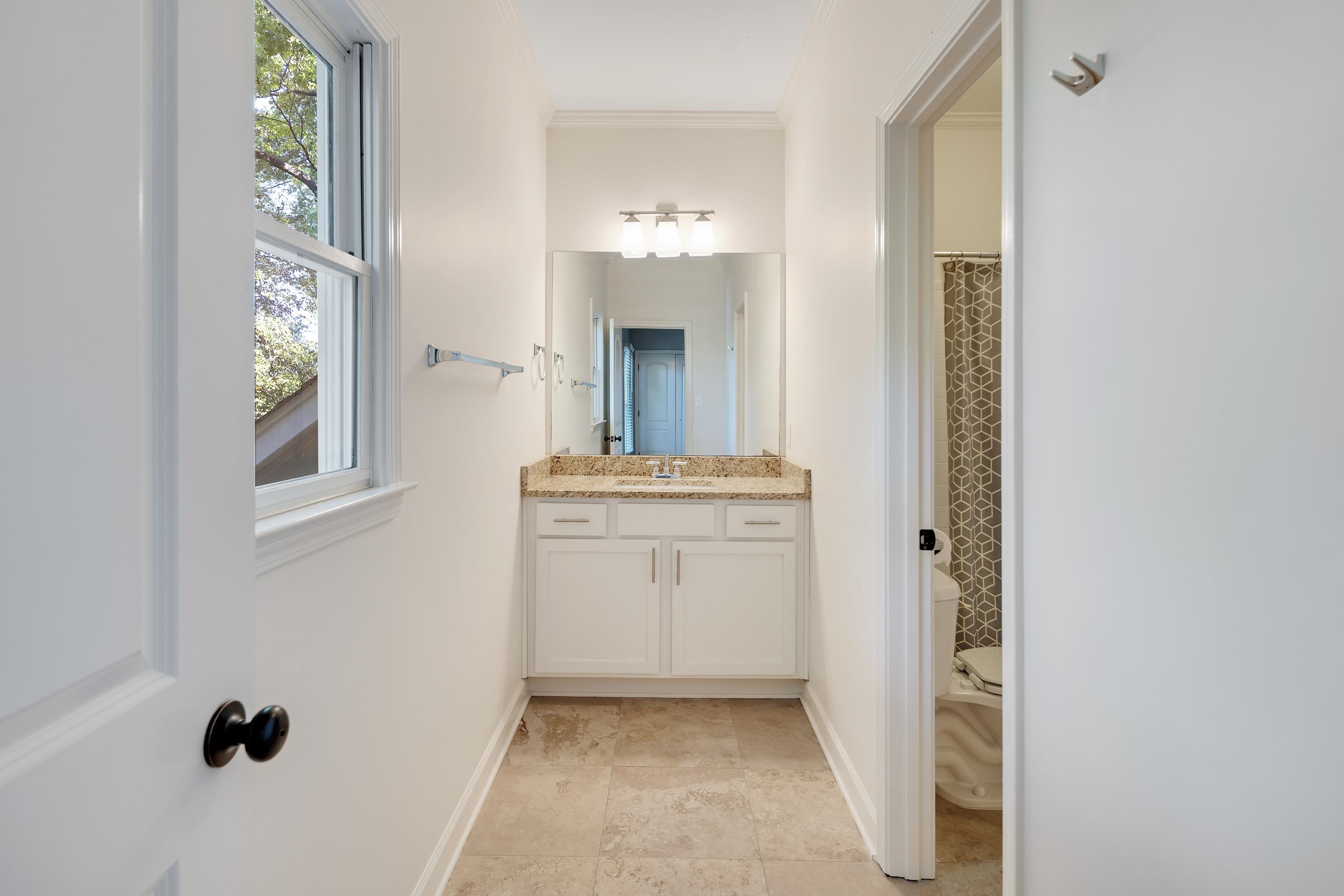 237 Windover Road Memphis, TN 38111 - Photo 30 of 37 Full bath with vanity, a shower with curtain, and ornamental molding