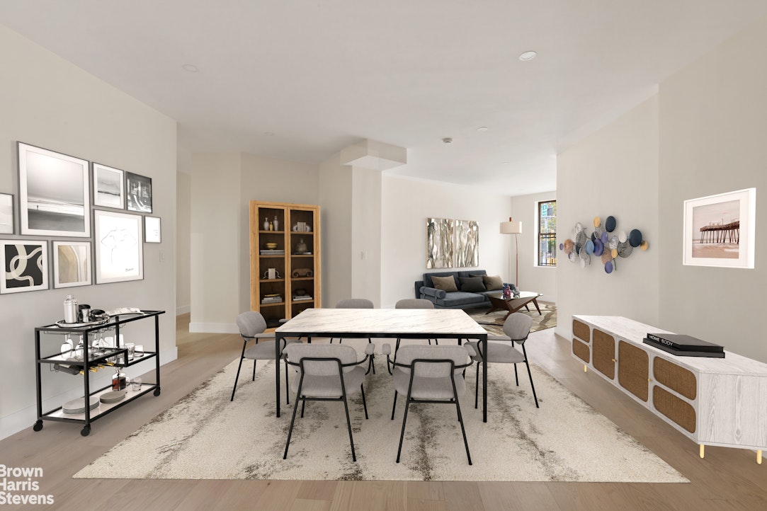 a view of a dining room with furniture and window