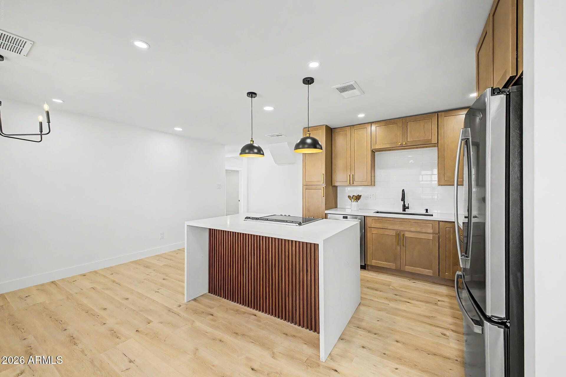 5232 West Hearn Road Glendale, AZ 85306 - Photo 2 of 32 a kitchen with a sink appliances and cabinets