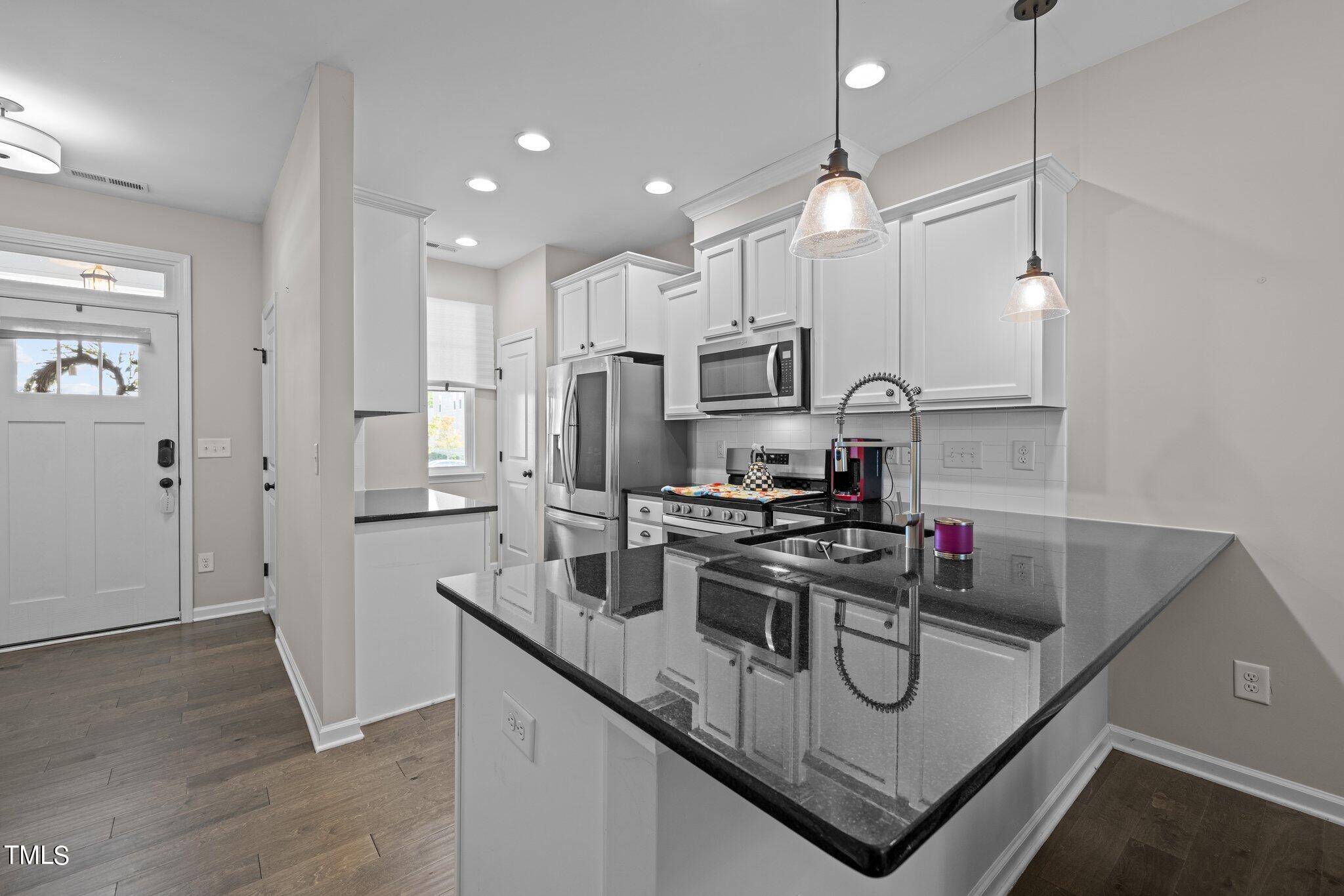 121 Zante Currant Road Durham, NC 27703 - Photo 4 of 30 Bright Kitchen with Granite Countertoops