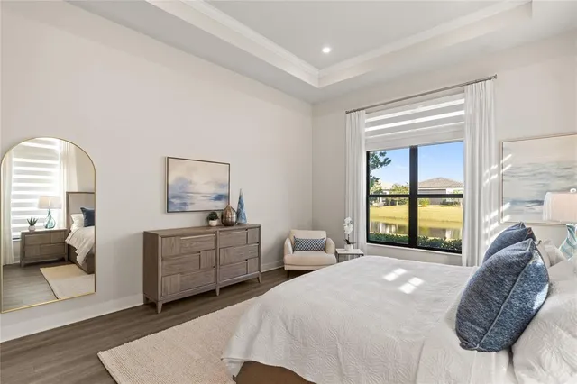 a bedroom with a bed and a couch