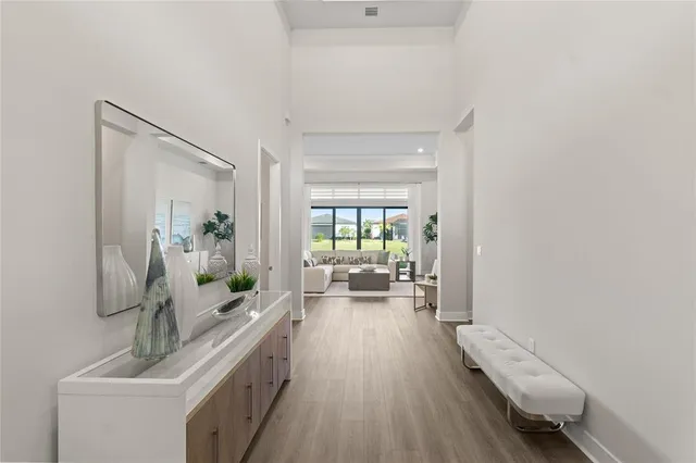 a view of a living room and hardwood floor