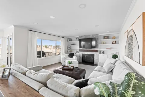 a kitchen with stainless steel appliances a sink and cabinets