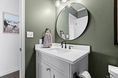 a work room with furniture and a window