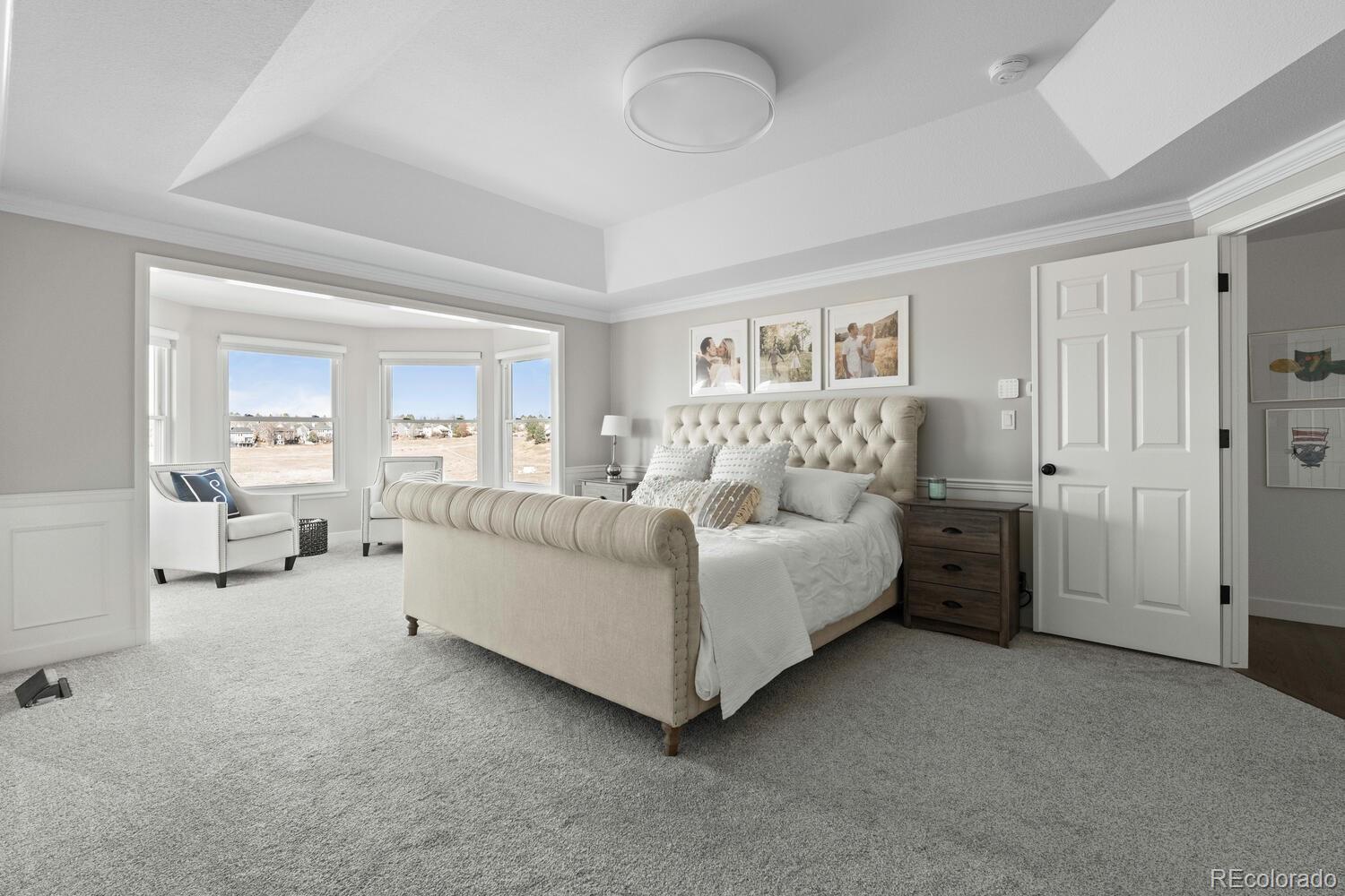 8855 South Wild Iris Run Highlands Ranch, CO 80126 - Photo 21 of 48 a living room with furniture and a window